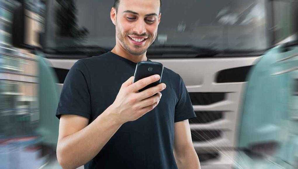 man distracted by phone