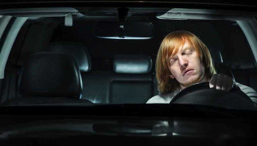 Too Tired to Drive: Preventing Drowsy Driving Accidents in Sarasota - Sleeping Driver