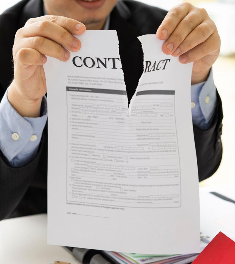 Man ripping Contract