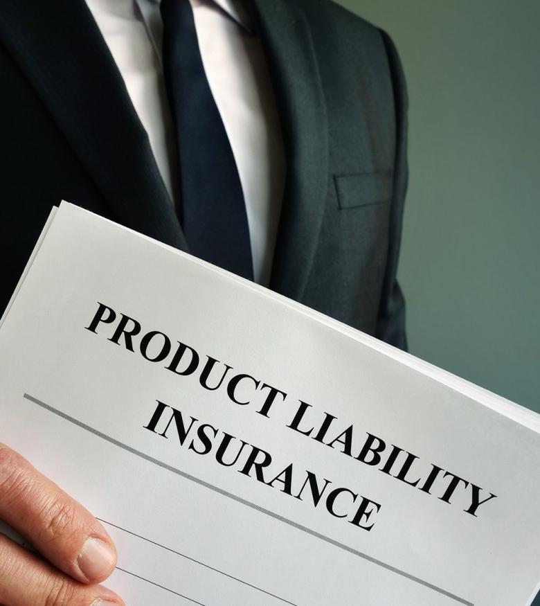 Product Liability Lawyers in Sarasota, FL - Man holding product liability papers
