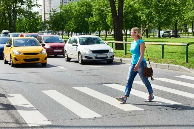 JAX Pedestrian Death Zone: Can the City Become a Better Place to Walk? - women walking on pedestrian lane