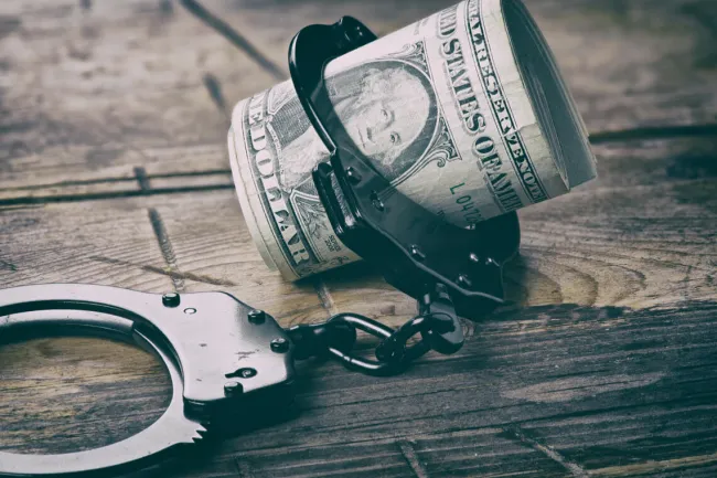 Money in handcuffs