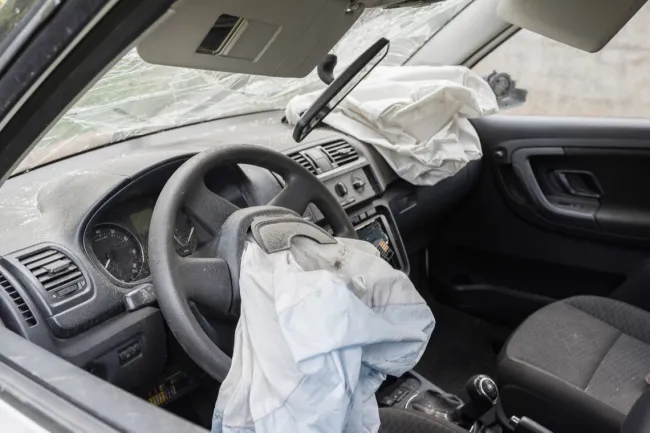 steering wheel with deflated deployed airbag