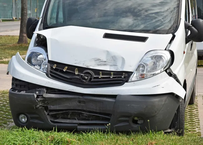Record-Setting Rower Killed in Team Van Crash - Wrecked white Van